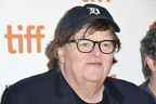 Le réalisateur Michael Moore au TIFF.  Son ex-femme le poursuit en justice et son nouveau film est en panne. 