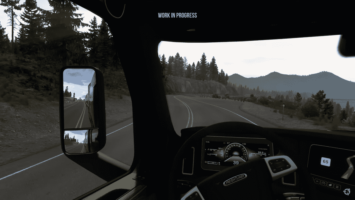 American Truck Simulator Montana a view from the truck cab as it rounds a curve in the mountains.