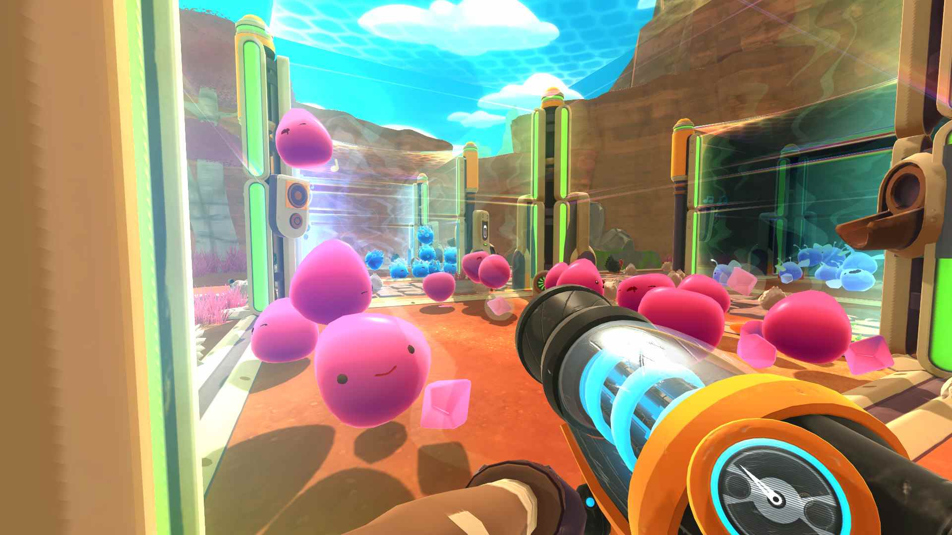 Slimes dans un enclos, reculant de la pince dans Slime Rancher