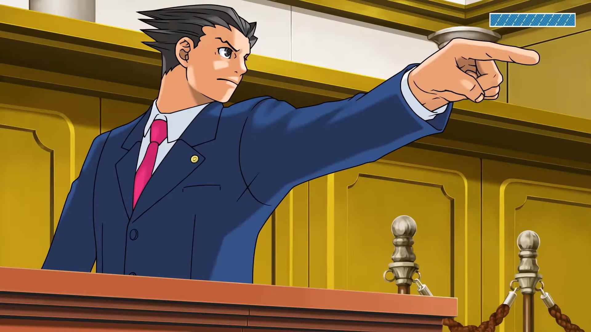 Une image du personnage Phoenix Wright dans la salle d'audience.  Il adopte sa signature, doigt levé 