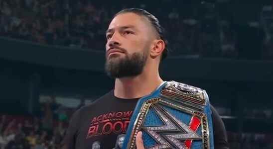 Roman Reigns holding the Universal Title on SmackDown