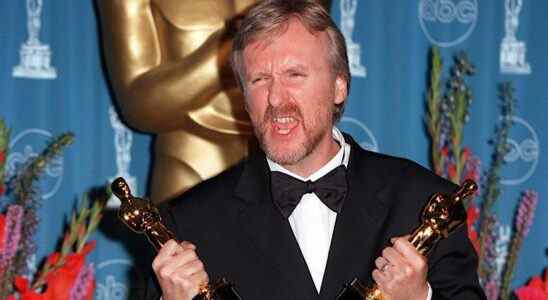 James Cameron with two oscars.