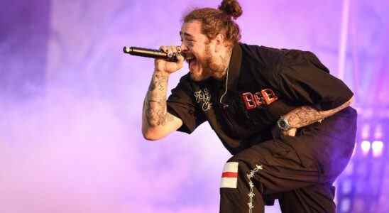 Post Malone prend un mauvais déversement après être entré dans le trou sur scène lors d'un concert à Saint-Louis