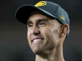 Ricky Ray participe à sa cérémonie d'intronisation du mur d'honneur lors du match des Eskimos d'Edmonton et des Tiger-Cats de Hamilton au stade du Commonwealth, à Edmonton, le vendredi 20 septembre 2019.