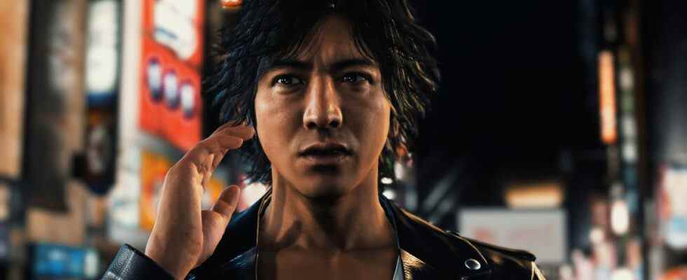 Judgment - Yagami stands on a city street, looking above