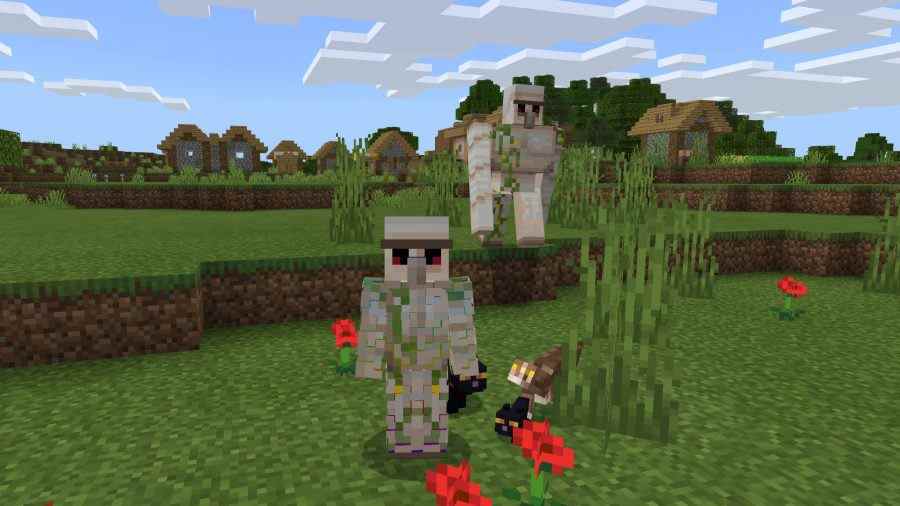 Le joueur a une peau de golem dans Minecraft.  Il se tient à côté d'un vrai golem et d'une bande de chats.