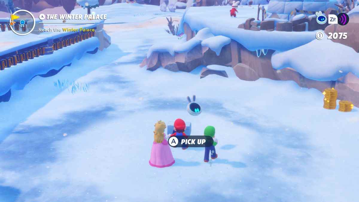 Peach, Mario et Luigi se tiennent à côté de la deuxième brique Igloo pour la quête Igloo Breakthrough dans Mario + Rabbids Sparks of Hope