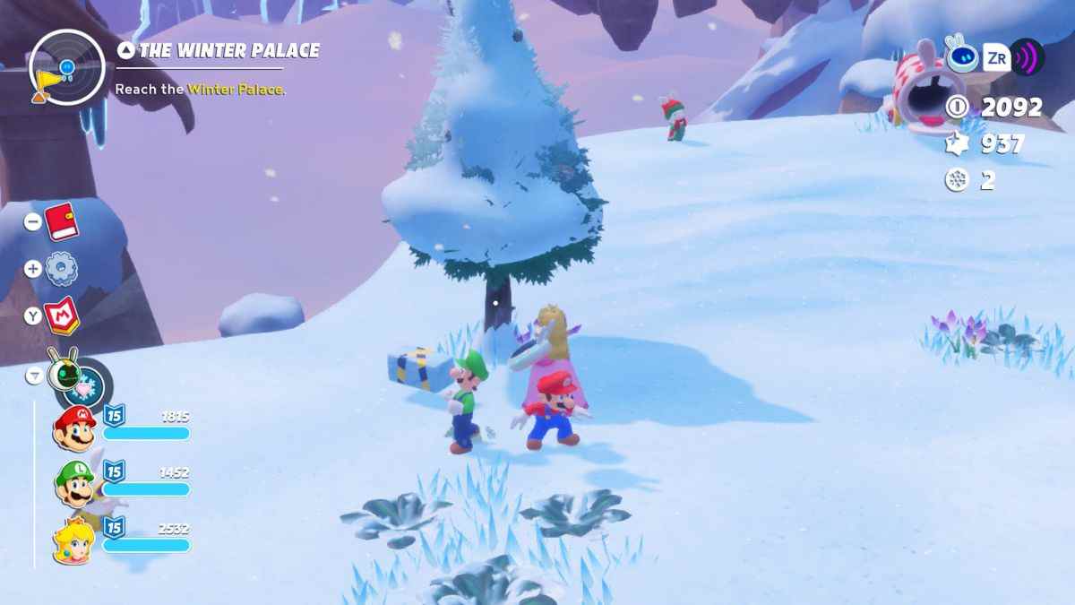 Peach, Mario et Luigi secouent la troisième brique Igloo d'un arbre pour la quête Igloo Breakthrough dans Mario + Rabbids Sparks of Hope