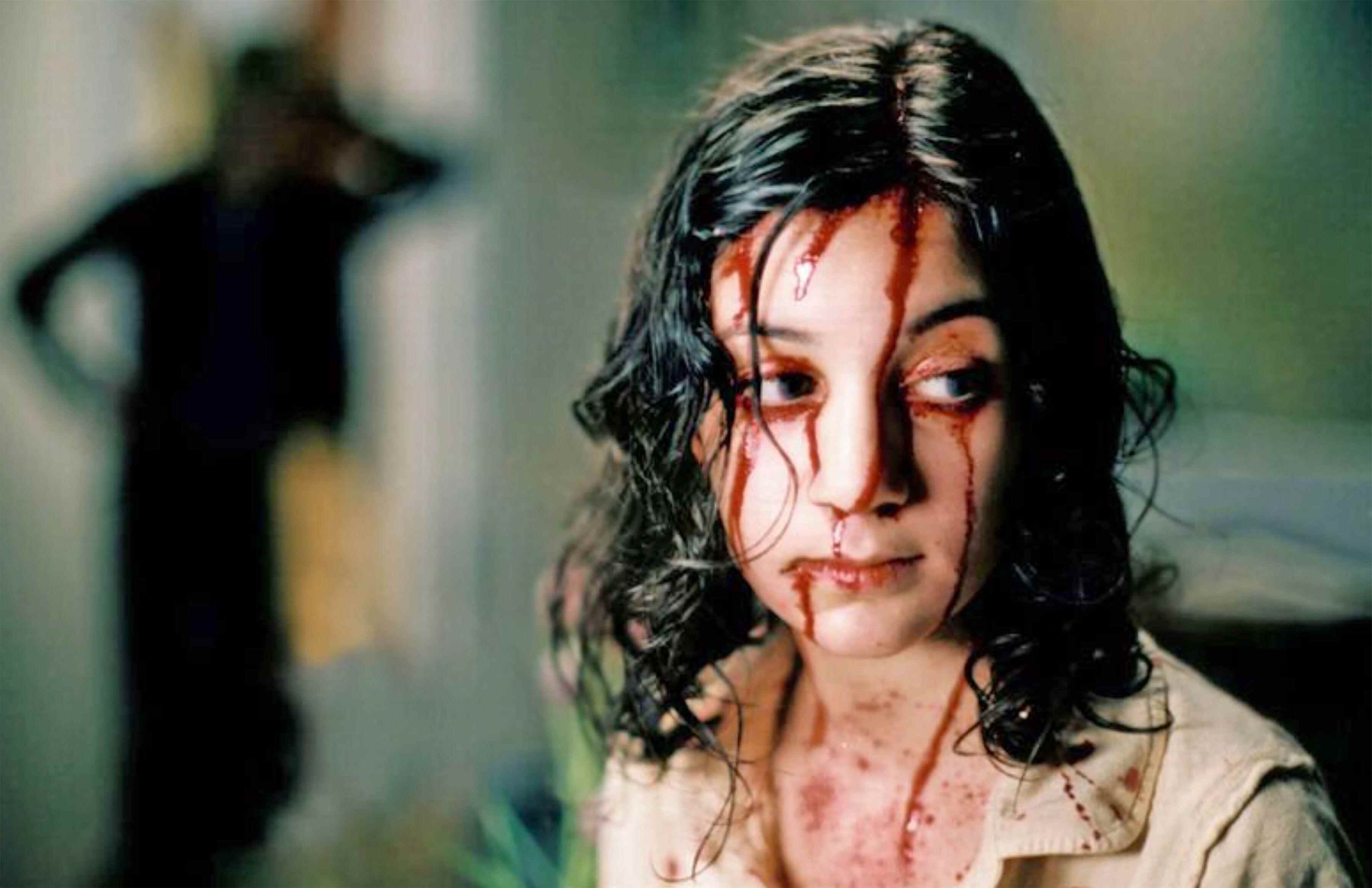 Lina Leandersson dans Let The Right One In, l'un des meilleurs films d'horreur à 95% et plus sur Rotten Tomatoes