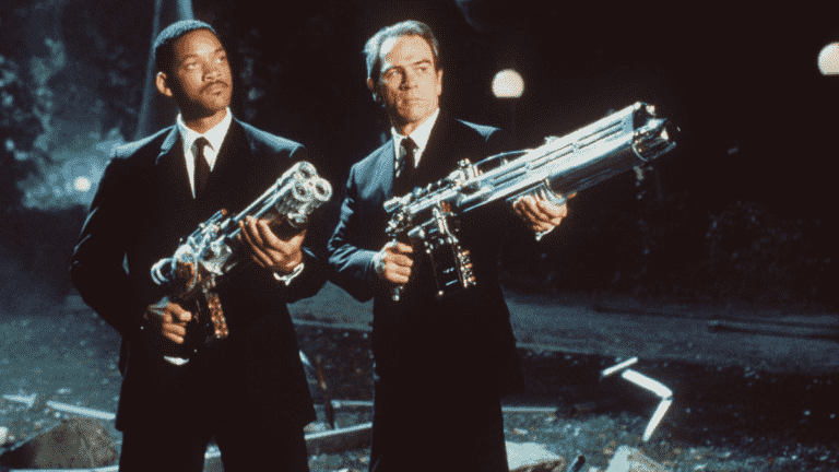 Will Smith and Tommy Lee Jones aim at an alien in Men in Black