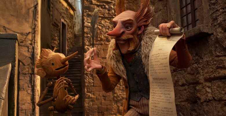 Guillermo del Toro's Pinocchio - (L-R) Pinocchio (voiced by Gregory Mann) and Count Volpe (voiced by Christoph Waltz). Cr: Netflix © 2022