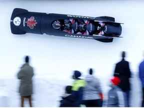 Bobsleigh - Bob & Skeleton World Cup et IBSF European Championships - Saint-Moritz, Suisse - 16 janvier 2022. Les Canadiens Justin Kripps, Ryan Sommer, Cam Stones et Jay Dearborn en action pendant le Four-Man Bobsleigh.