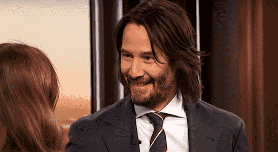 Keanu Reeves smiles at Drew Barrymore on The Drew Barrymore Show.