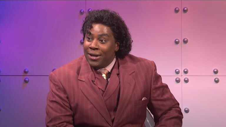 Kenan Thompson sitting during What