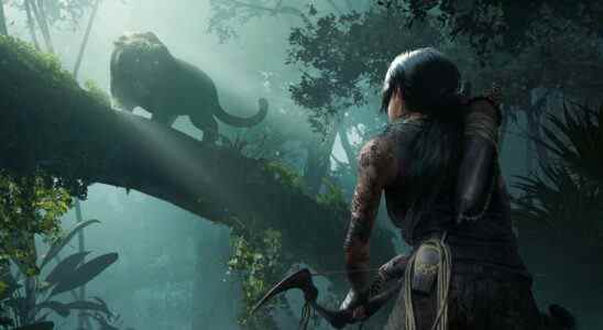 Shadow of the Tomb Raider - A bow-wielding Lara Croft stares down an irate jaguar.