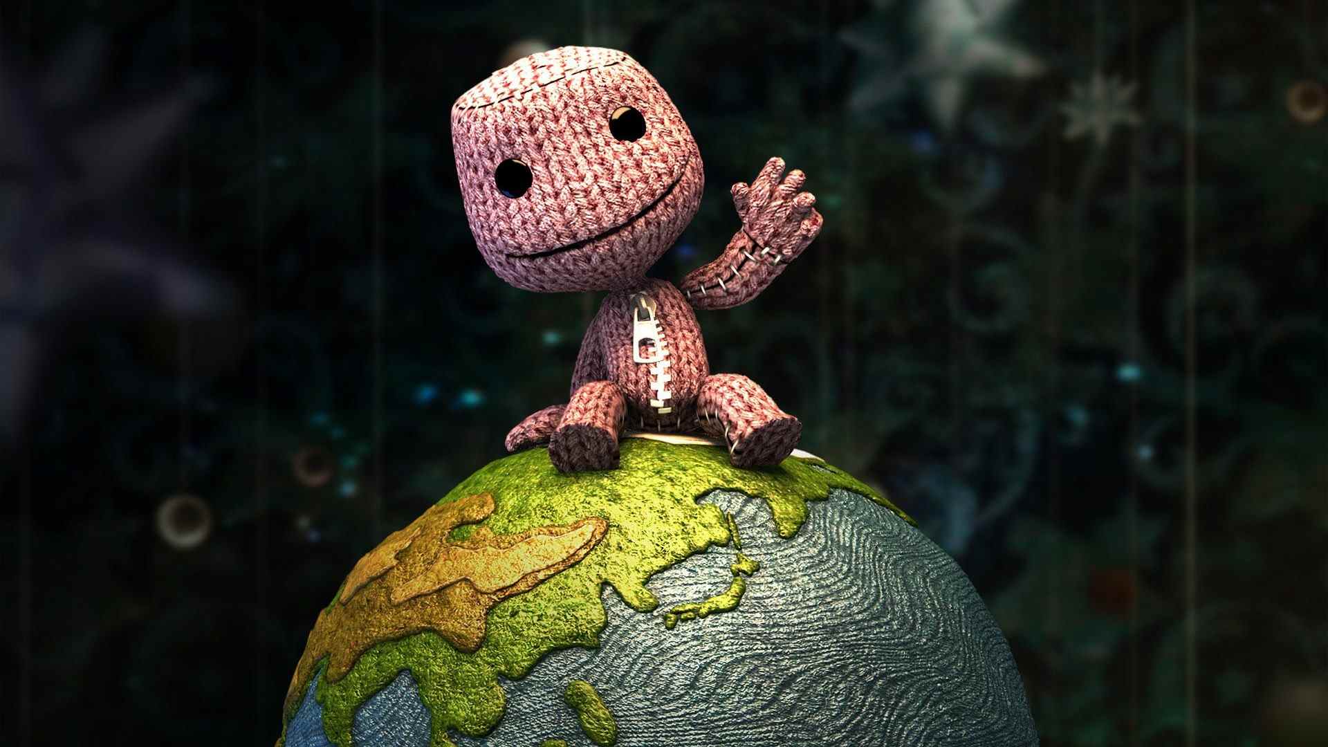 meilleurs jeux PSP : Sackboy assis sur un globe et saluant