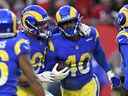 Le secondeur extérieur des Rams de Los Angeles Von Miller (40) et l'ailier défensif Aaron Donald (99) devraient mettre beaucoup de chaleur sur le QB Joe Burrow des Bengals lors du Super Bowl de dimanche.