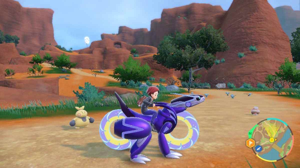 L'entraîneur de Pokémon chevauche un Miraidon dans le monde ouvert de Pokémon Scarlet Scarlet et Violet