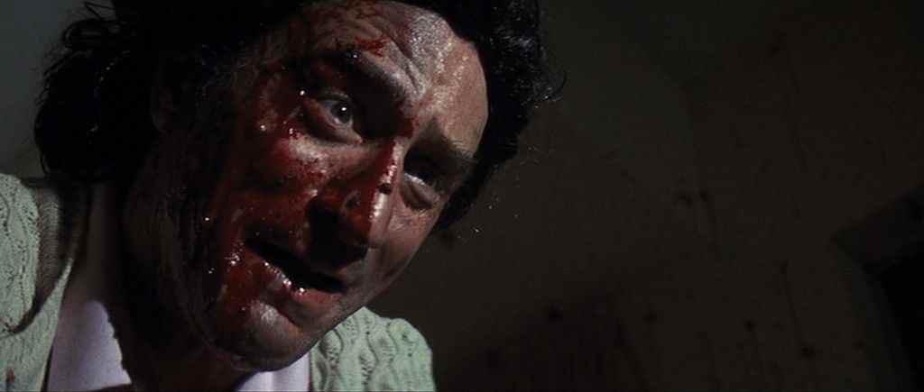 Robert De Niro à Cape Fear avec du sang sur le visage