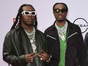 Takeoff, à gauche, et Quavo de Migos, arrivent aux BET Awards à Los Angeles le 27 juin 2021.