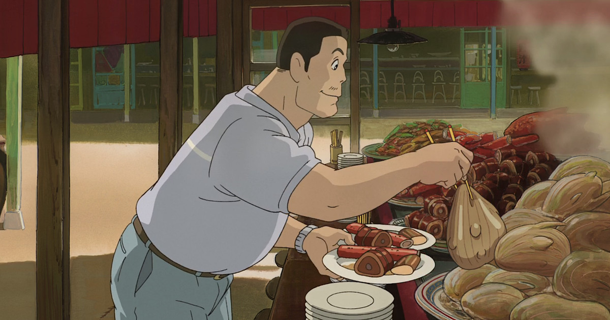 Le père de Chihiro, un homme costaud aux cheveux courts et à la petite moustache, empile des viandes étranges et luisantes sur une paire d'assiettes provenant d'un mystérieux buffet sans surveillance dans le film d'animation Spirited Away du Studio Ghibli