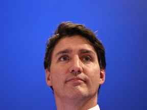 Le Premier ministre canadien Justin Trudeau donne une conférence de presse lors du sommet de la Coopération économique Asie-Pacifique (APEC) à Bangkok le 18 novembre 2022. (Photo de Jack TAYLOR / AFP)