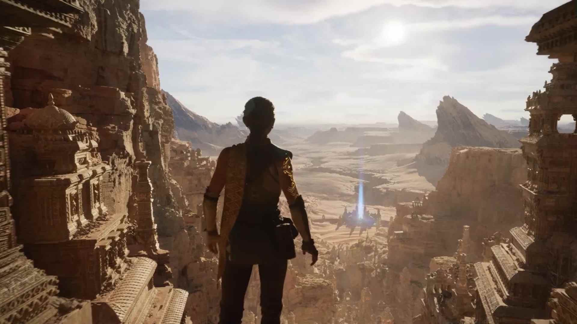 Un cliché de la démo technologique Unreal Engine 5.  Une femme regarde un paysage désertique