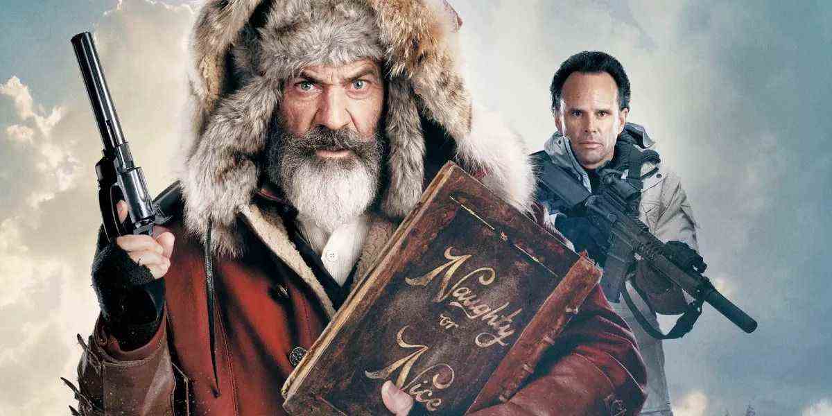 Chris Kringle (Mel Gibson), vêtu d'un manteau rouge et d'une énorme ushanka d'hiver à fourrure, tient un gros revolver et serre un livre intitulé 