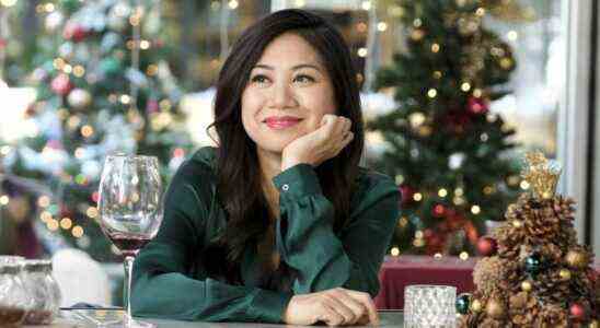 Liza Lapira as Natalie in Must Love Christmas