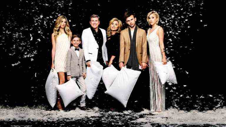 Todd and Julie Chrisley with Lindsie, Savannah and more family.