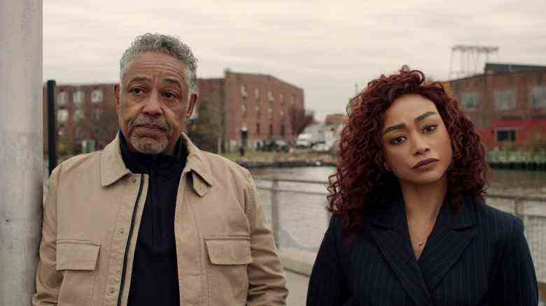 Kaleidoscope. (L to R) Giancarlo Esposito as Leo Pap, Tati Gabrielle as Hannah Kim in episode “Yellow” of Kaleidoscope. Cr. Courtesy of Netflix © 2022