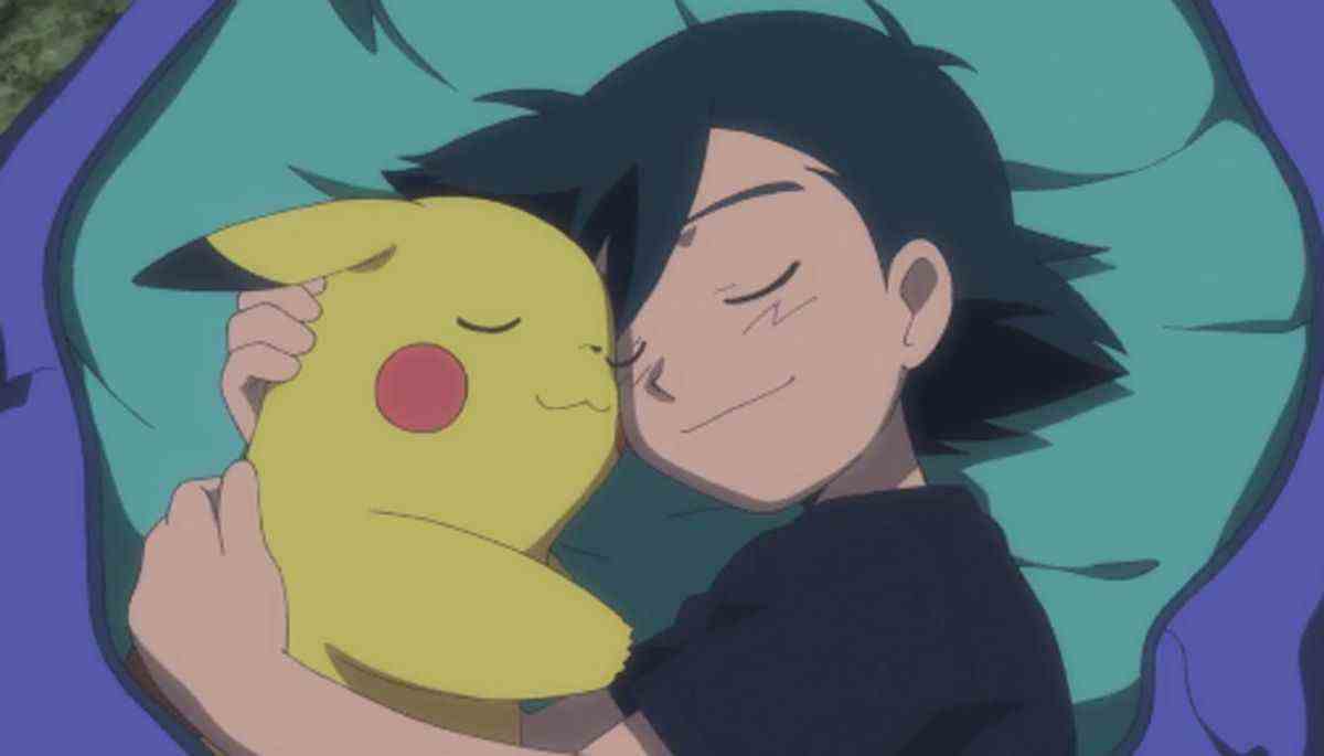 Ash et Pikachu allongés ensemble dans leur lit.