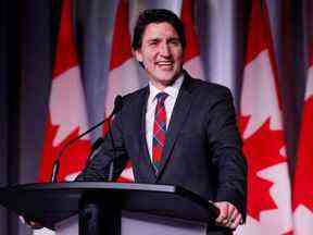 Le premier ministre du Canada, Justin Trudeau, prend la parole lors de la fête des Fêtes du caucus national libéral à Ottawa, Ontario, Canada, le 14 décembre 2022. REUTERS/Blair Gable