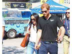 Le prince Harry et Meghan Markle au Nathan Phillps Square.  lors des Jeux Invictus de tennis en fauteuil roulant le lundi 25 septembre 2017.