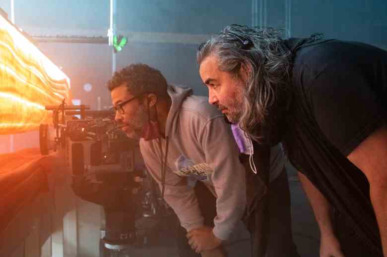 Director Jordan Peele and cinematographer Hoyte van Hoytema observe a shot in the film "Bope."