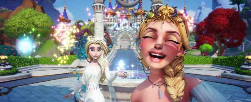 Disney Dreamlight Valley player character smiles while posing with Elsa outside the castle