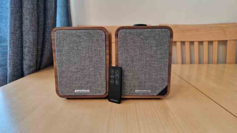 Ruark MR1 Mk2 Bluetooth Speakers Review image showing both speakers next to one another with the remote control leaning against the front of them