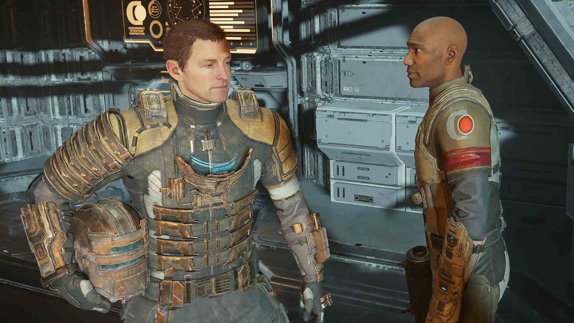 Dead Space Remake Review: Isaac Clark sans casque debout à côté de Zach Hammond