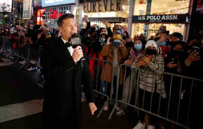 NEW YORK, NEW YORK - DECEMBER 31: Ryan Seacrest speaks  during the 2021 New Year’s Eve celebrations in Times Square on December 31, 2021 in New York City. Despite a major surge in Covid -19 cases in New York City and across the country, the city held a scaled-down celebration for the annual ball drop. This year, a maximum of 15,000 people will be in attendance, down from approximately 60,000, and proof of vaccination and protective masks are required. (Photo by John Lamparski/Getty Images)