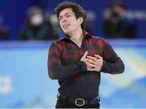 Le Canadien Keegan Messing réagit à la fin de son programme libre dans la compétition masculine de patinage artistique aux Jeux olympiques d'hiver de 2022 à Pékin, le jeudi 10 février 2022.