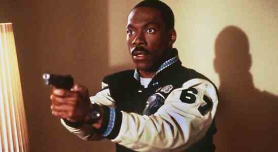 Eddie Murphy holding gun in Beverly Hills Cop III