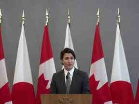 Le Premier ministre canadien Justin Trudeau prononce une allocution lors d'un déjeuner avec le Premier ministre japonais Fumio Kishida, le jeudi 12 janvier 2023 à Ottawa.