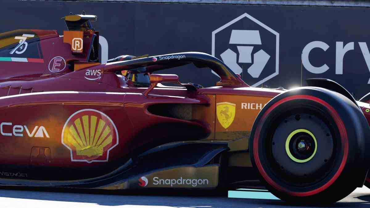 A screenshot of a Ferrari from the side taken in F1 22