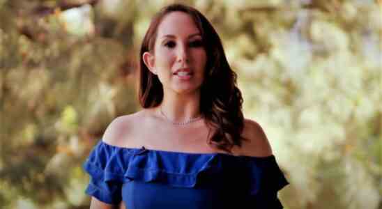 Cheryl Burke in blue dress in Diving Deep with Cheryl Burke