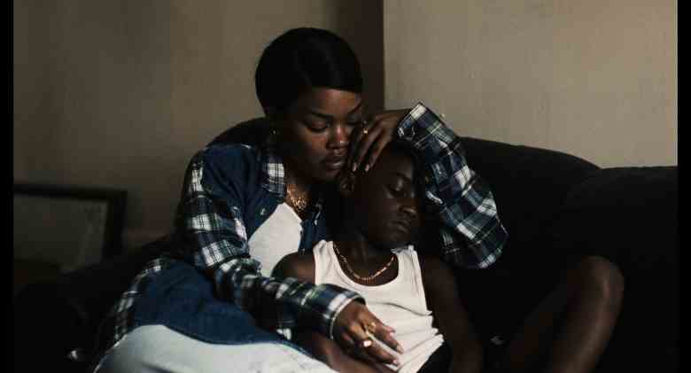 Teyana Taylor embraces Aaron Kingsley Adetola in a still from "A Thousand And One"