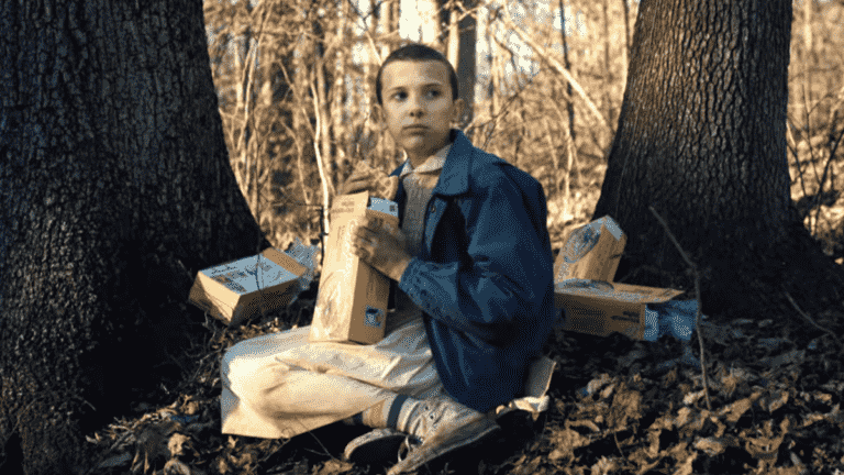 millie bobby brown as eleven eating waffles in the woods