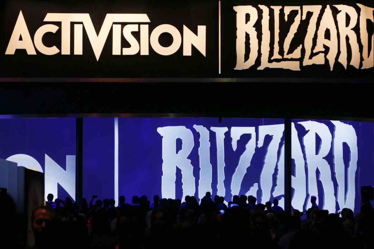 Giant screens displaying Activision and Blizzard logos at E3 2013.