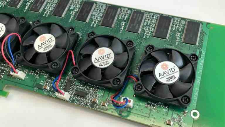 A Voodoo 5 6000 graphics card with fans covering chips