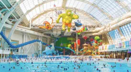 The DreamWorks Water Park featuring Shrek, Kung Fu Panda, and Madagascar characters above the pool.