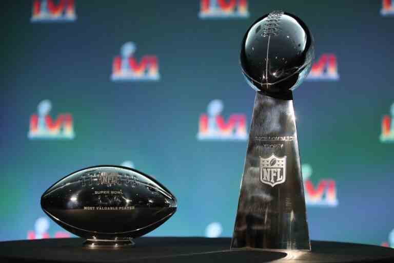 LOS ANGELES, CALIFORNIA - FEBRUARY 14: The Pete Rozelle Trophy given to the Super Bowl MVP, and the Vince Lombardi Trophy are seen during the Super Bowl LVI head coach and MVP press conference at Los Angeles Convention Center on February 14, 2022 in Los Angeles, California. (Photo by Katelyn Mulcahy/Getty Images)